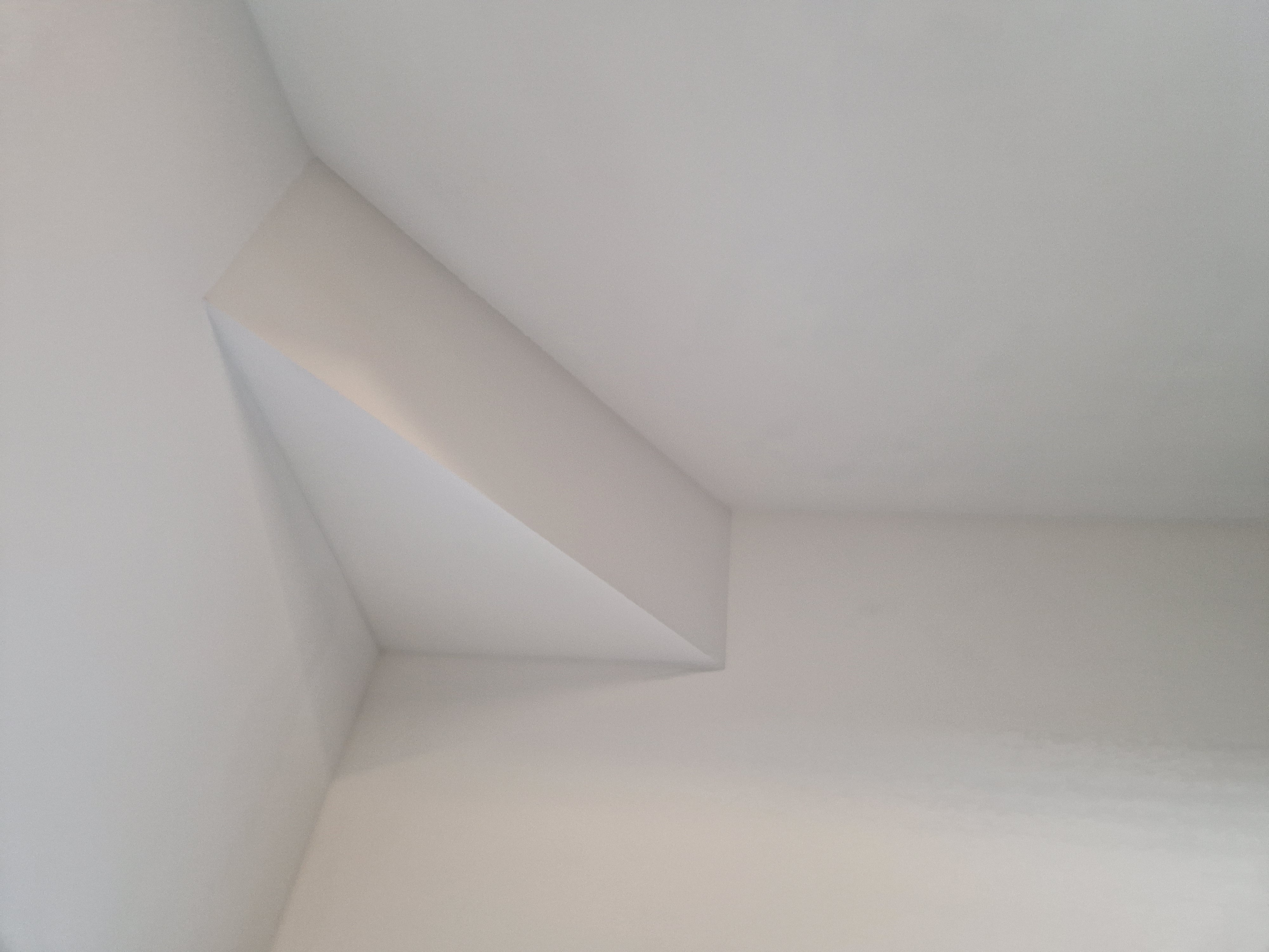 Fixing new pieces of drywall to the ceiling